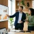 Consulente Zukkero che analizza i risultati marketing con una cliente